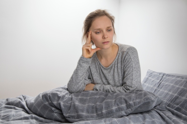 sick-woman-suffering-from-fatal-insomnia